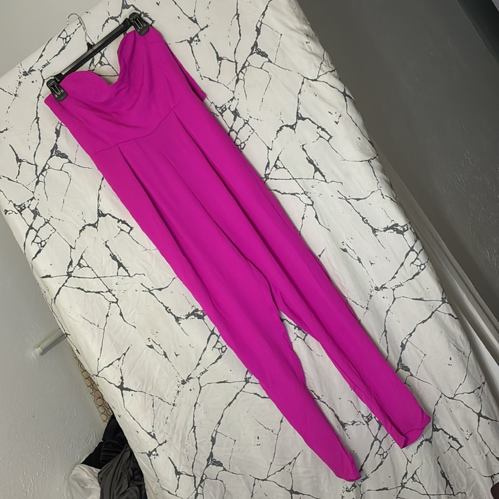 Striking Pink Pantsuit with Flowing Fabric and Relaxed Fit